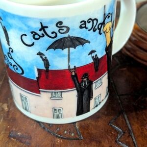Chaleur. "It's Raining Cats Dogs" Art by Michelle Broussard 14 oz Mug
